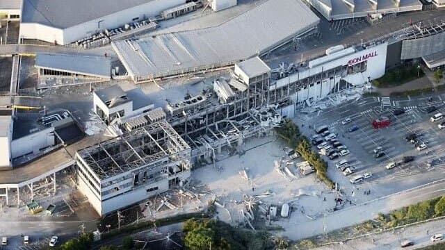 At least 13 dead in Japan earthquake as rescuers search for people trapped in mall