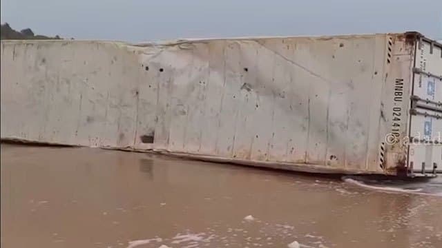 Shipping container washes ashore behind tourist hotel in Induruwa