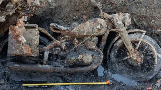 Danube river's low water levels reveal remains of WWII soldiers and motorcycle