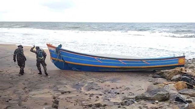 Suspected Indian fishing vessel washes ashore at Iranawila