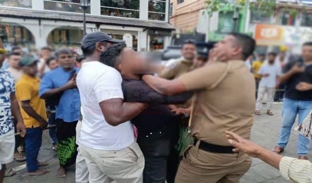 Man arrested for verbally abusing police officers on duty at Kandy Dalada Perahera