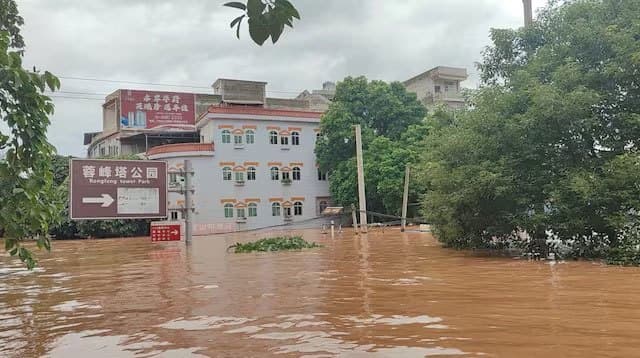Homes submerged, tens of thousands relocated in China's south as flooding intensifies
