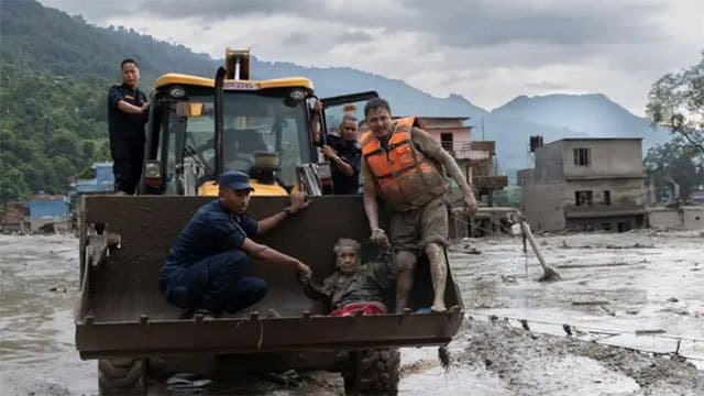 More than 150 dead and hundreds missing after flash floods hit Nepal-Tibet border