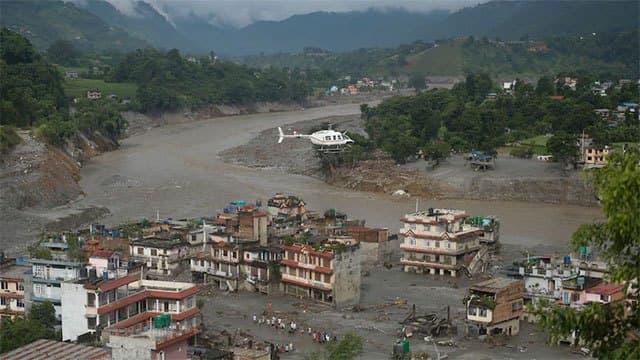 Nepal warns of possible fresh flooding as victims reel under devastation