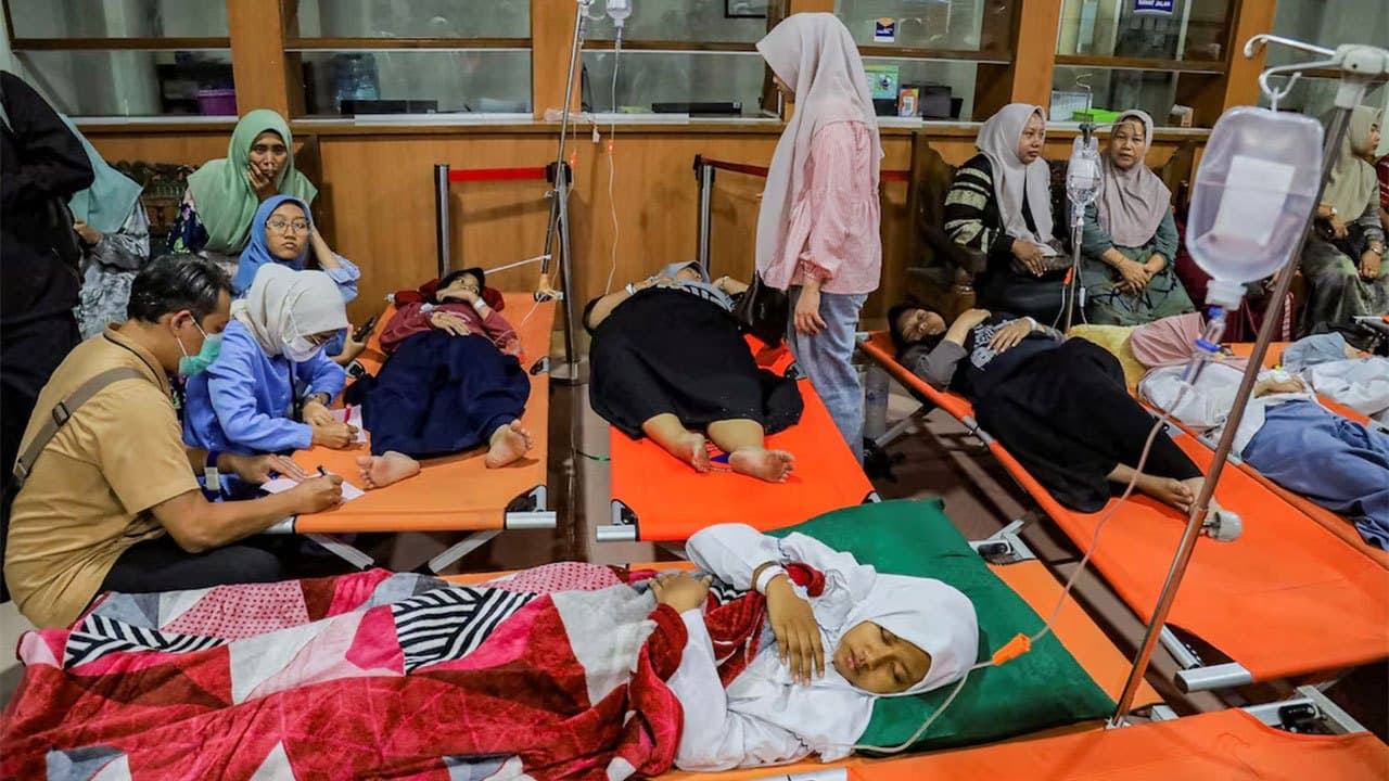 Indonesian officials suspect food poisoning from free school meal after more than 500 fall ill