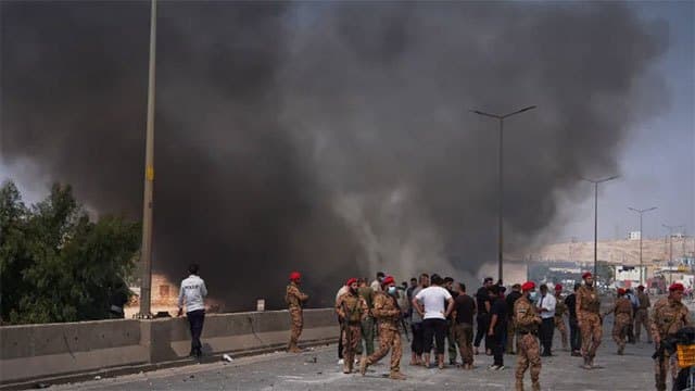 At least 14 killed in explosion at weapons depot in Syria's Idlib, state TV says