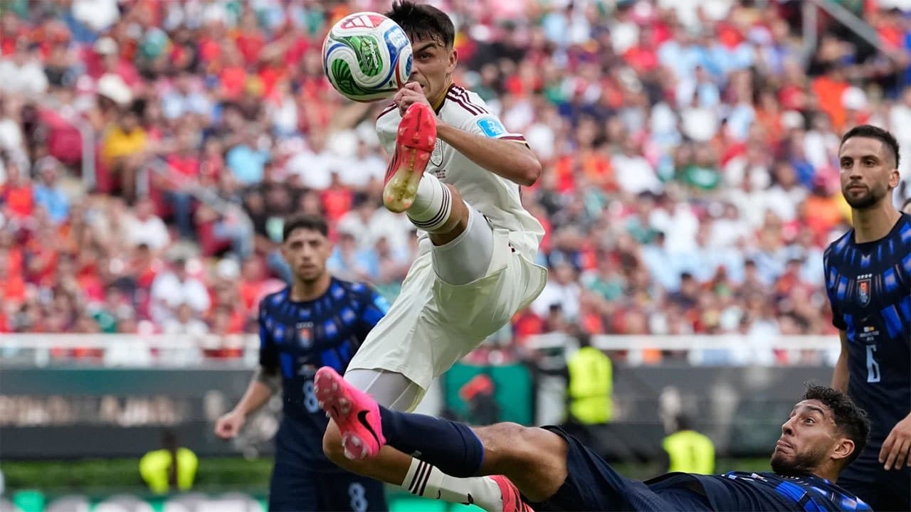 Spain wins its World Cup group, beating Uruguay 1-0 to send 2-time champion home