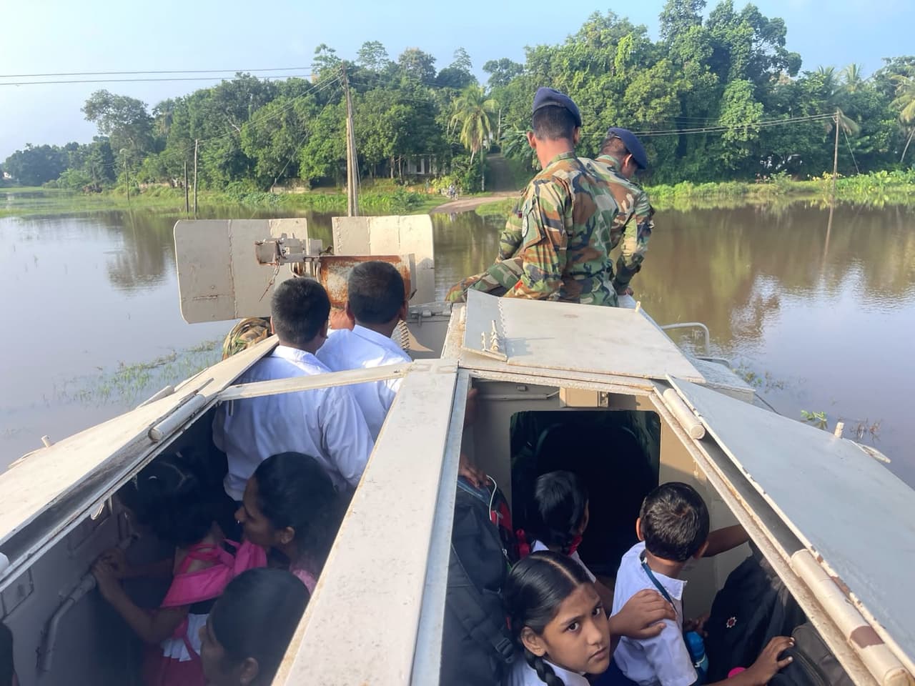 Army assists schoolchildren in flood-hit Malimbada… - image 15